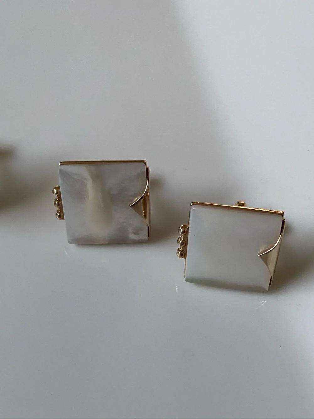 3 sets of Cuff Links. Gold tone, Dante Watermelon & Swank Mother of Pearl